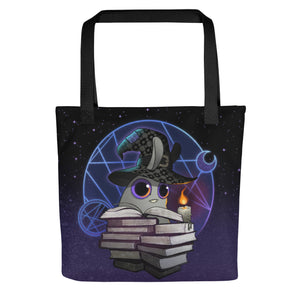 The Neon Witchbunny Tote from Bindlewood Shop features a whimsical bunny in a witch hat, reading among glowing symbols on a starry purple backdrop—a magical accessory perfect for fans of Amanda Louise Spayd’s enchanting style.