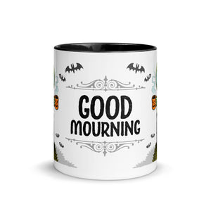 A ceramic, dishwasher-safe Halloween-themed Good Mourning Mug by Bindlewood Shop with a pun "good mourning" surrounded by decorative elements like bats, pumpkins, and ornate filigree, featuring artwork by Chris Ryniak