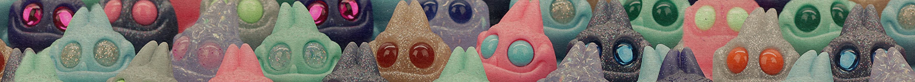 Banner featuring creatures with colorful eyes