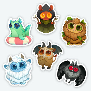 Presenting the "Cryptid" Mini Sticker Set from Bindlewood Shop: a charming assortment of six matte vinyl stickers featuring whimsical fantasy creatures. The set includes a green dragon, a hooded figure with red eyes, a leafy brown creature, a blue yeti, a bat-winged gremlin, and a black moth-like being. Each character is designed with big expressive eyes and an irresistibly cute appearance.