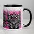 The Radbit Mug by Bindlewood Shop is a white ceramic mug with a black handle, showcasing a cartoon-style, wide-eyed Chris Ryniak monster with large ears and fangs, outlined in black against a vibrant pink splatter background. This colorful printed ceramic mug is perfect for adding a playful touch to your daily routine.