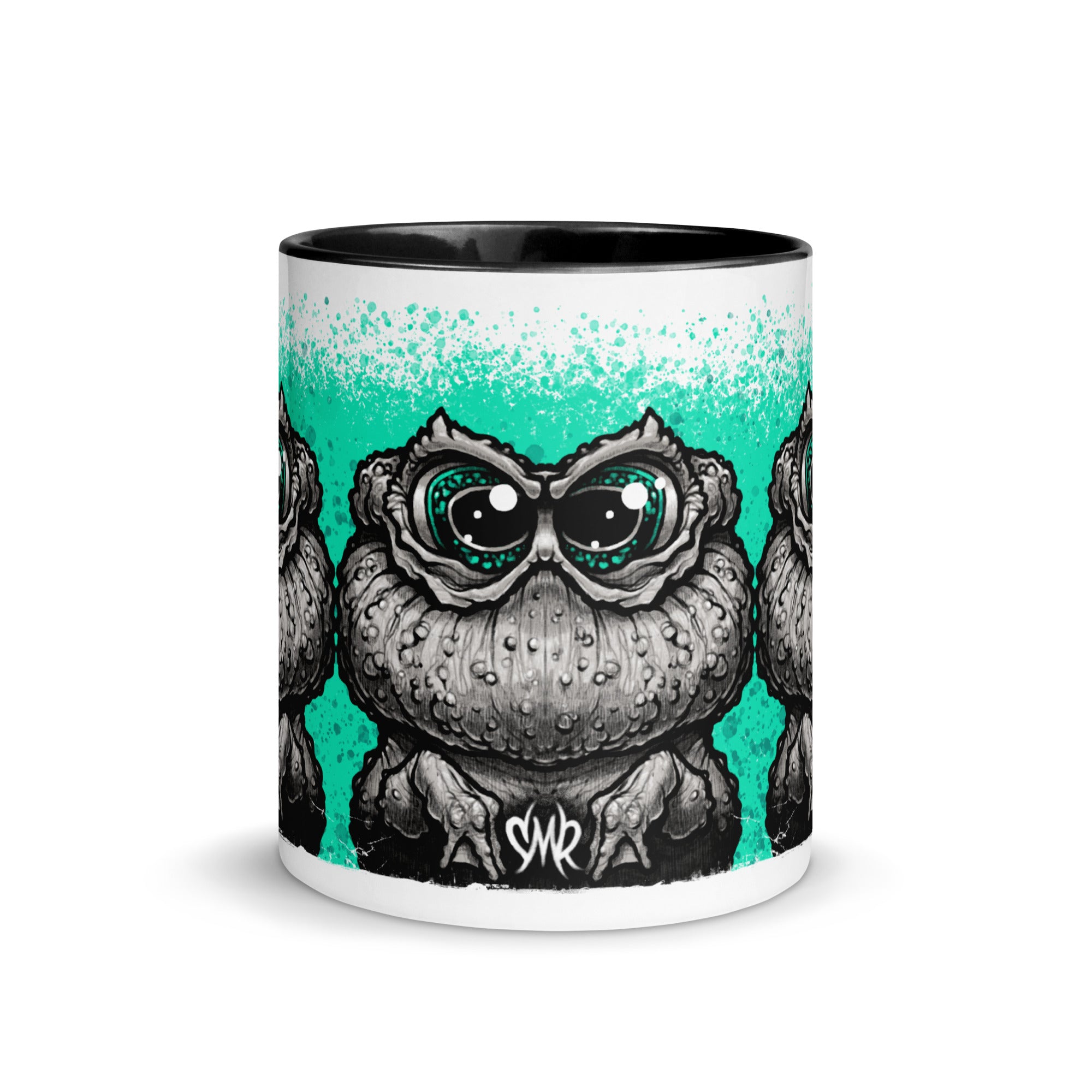The Tode Mug by Bindlewood Shop is a white ceramic mug with a black interior, showcasing a bold, cartoon-style frog with large eyes and textured skin set against a turquoise background in a mirrored, repeated pattern—an ideal collectible art mug for enthusiasts of whimsical design.