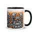 The Krabb Mug from Bindlewood Shop is a white ceramic mug with a black handle, showcasing a cartoonish angry crab with big claws, orange eyes, and sharp teeth against an orange splatter background—an ideal choice for fans of Chris Ryniak’s whimsical monster mug designs.