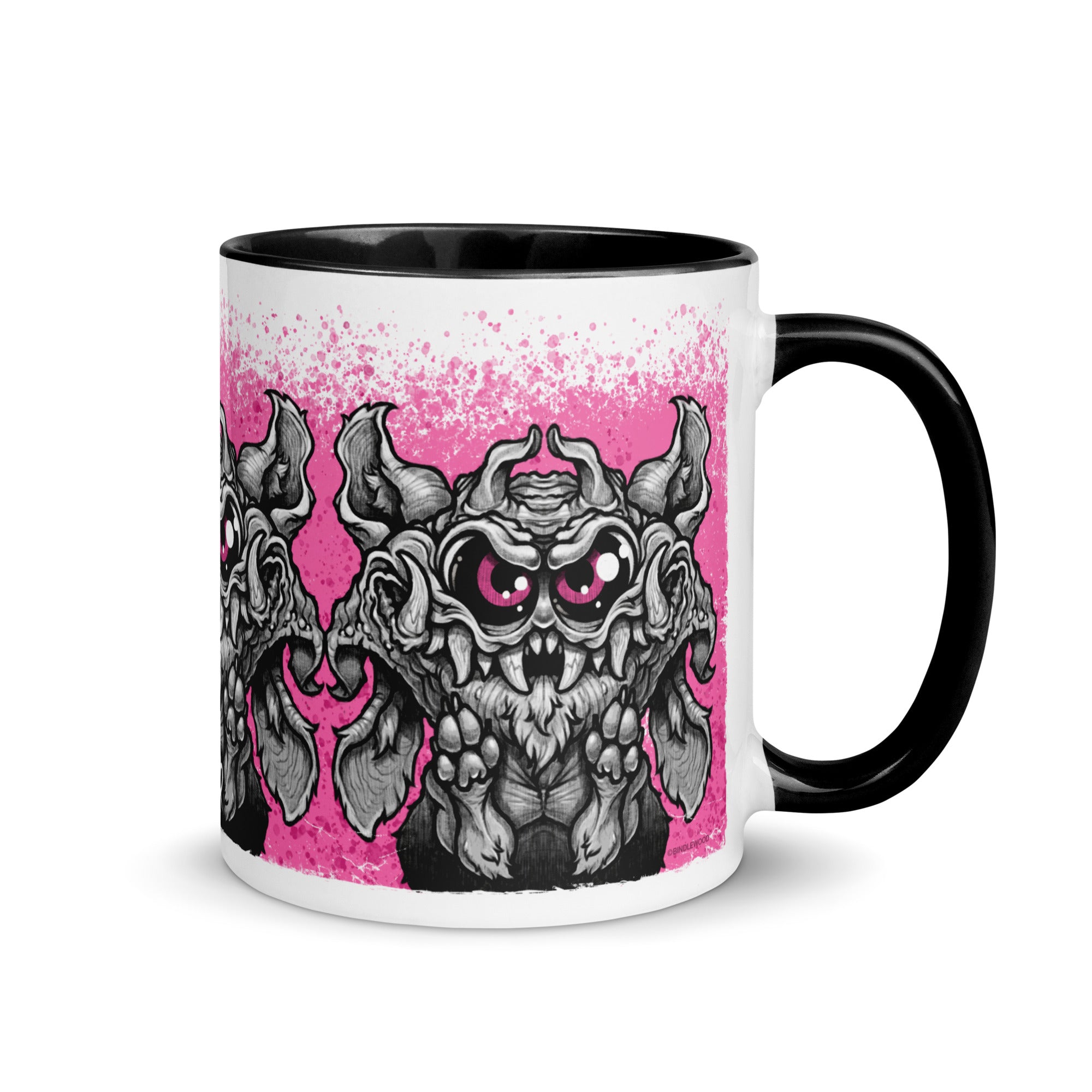 Introducing the Radbit Mug from Bindlewood Shop—a white ceramic mug with a black handle, featuring Chris Ryniak’s iconic Radbit monster. The design highlights Radbit’s expressive big eyes, prominent claws, and a textured body set against playful pink background accents. Both cute and fierce, this printed ceramic mug is perfect for fans of unique creature art.