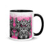 Introducing the Radbit Mug from Bindlewood Shop—a white ceramic mug with a black handle, featuring Chris Ryniak’s iconic Radbit monster. The design highlights Radbit’s expressive big eyes, prominent claws, and a textured body set against playful pink background accents. Both cute and fierce, this printed ceramic mug is perfect for fans of unique creature art.