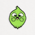 A cartoon-style green lime character with big, expressive eyes and a surprised face, hands on cheeks—reminiscent of the O.M.Ghost Pin (Glows in the Dark!) from Bindlewood Shop. Background is plain white.