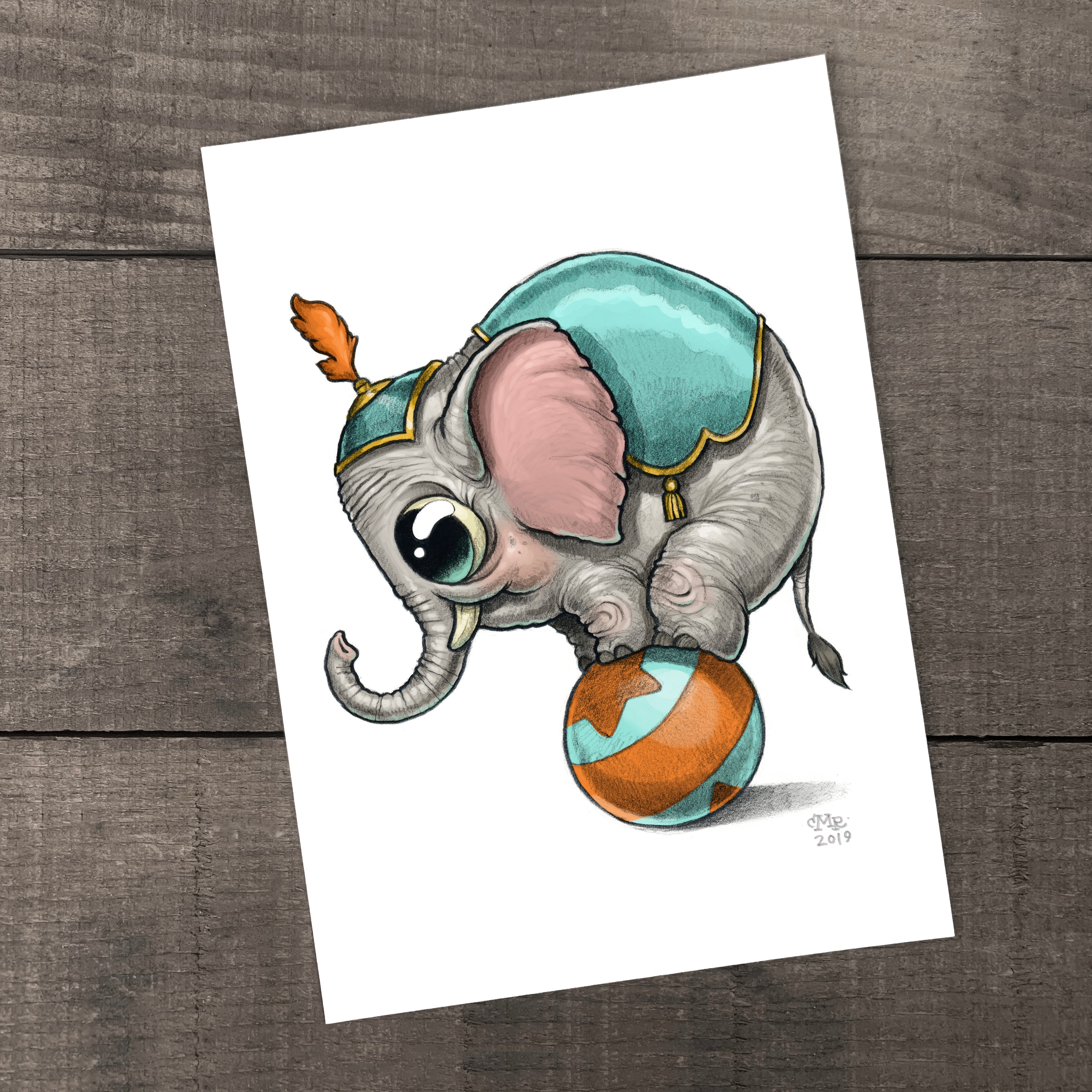 An adorable illustration of a baby elephant playfully balancing on a ball, wearing a cute circus hat, signed by the artist on archival fine art paper. ("Tiny Jumbo Print" by Chris Ryniak)