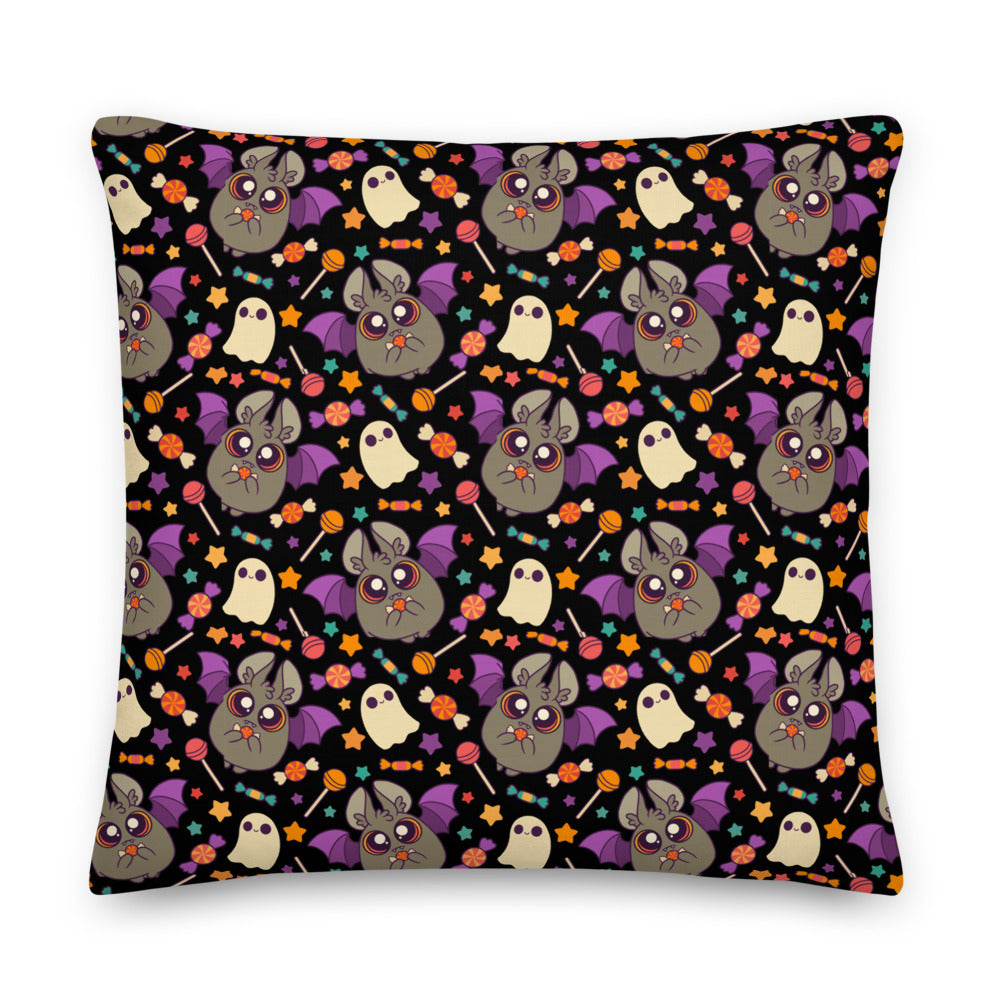 The Candy Bat Throw Pillow from the Bindlewood Shop's Amanda Louise Spayd Candy Bat collection showcases an adorable Halloween-themed design with cartoon bats, ghosts, and pumpkins in vibrant colors such as purple, orange, and green. The pattern repeats across the entire black decorative pillow, giving it a festive and playful look that is perfect for Spooky Season throw pillows.
