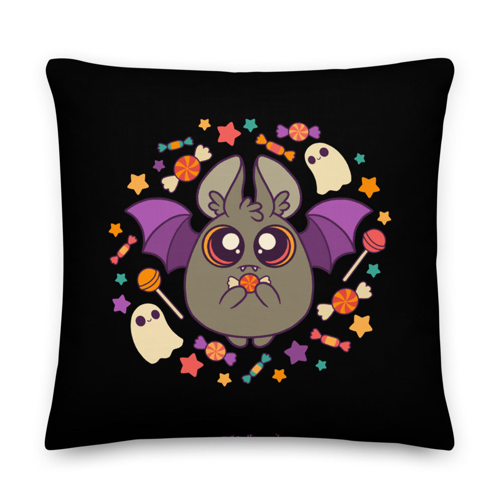 Introducing the Candy Bat Throw Pillow from Bindlewood Shop! This premium-feel decorative pillow showcases Amanda Louise Spayd's adorable Candy Bat, complete with large eyes, lavender wings, and blushing cheeks holding a piece of candy. Accented with colorful candies, stars, and two friendly white ghosts on a black background—perfect for Spooky Season decor!