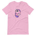 The Flooficorn Tee by Bindlewood Shop is a light pink, cozy shirt featuring a chubby unicorn with big green eyes, purple mane and tail, pink body, and sparkles—an adorable, gender-neutral choice for any unicorn fan.