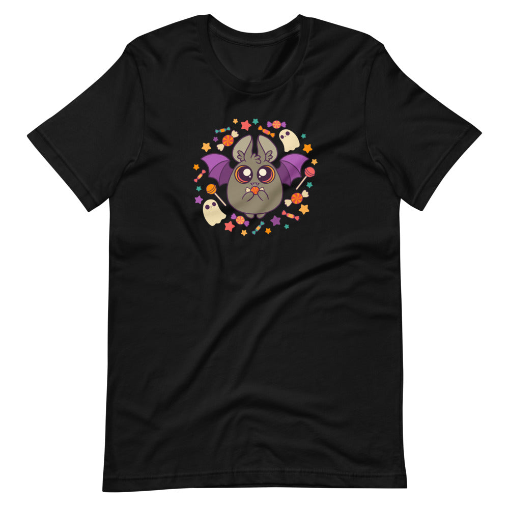 Introducing Bindlewood Shop's Candy Bat Tee: a black T-shirt showcasing an adorable cartoon bat with pink wings, large eyes, and rosy cheeks. The design includes vibrant flowers and small ghost figures that perfectly capture the Halloween spirit. This gender-neutral fit is designed for everyone, and each shirt is printed to order to ensure the highest quality.